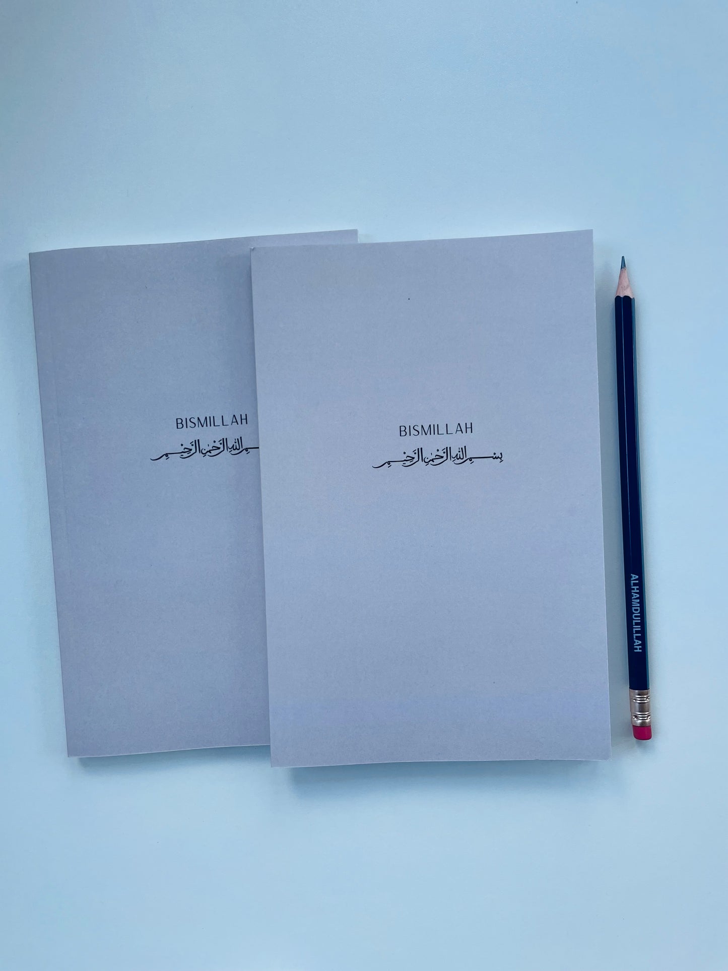 Bismillah Islamic lined notebook with aesthetic cover on desk