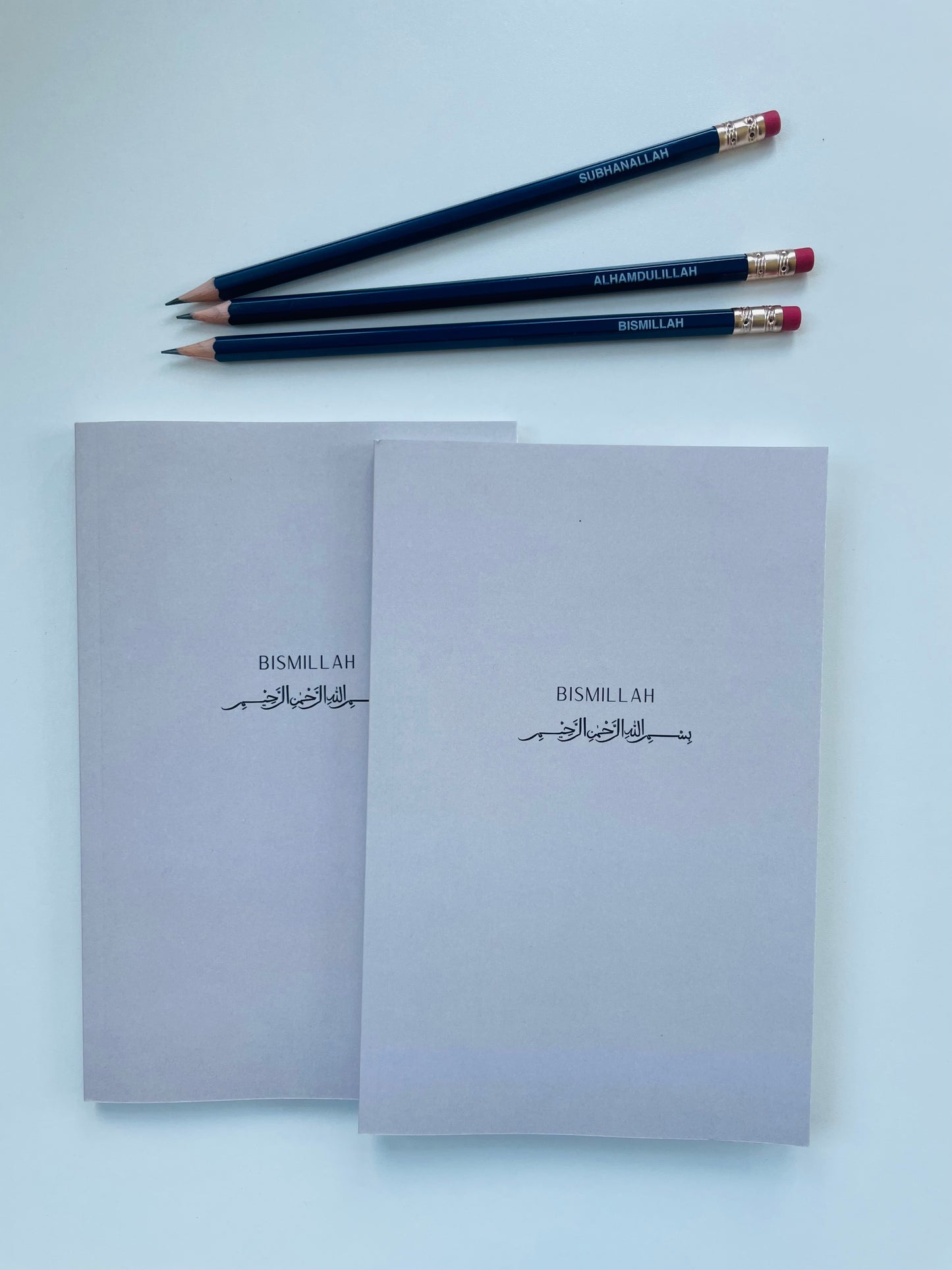 Bismillah Islamic lined notebook with aesthetic cover on desk
