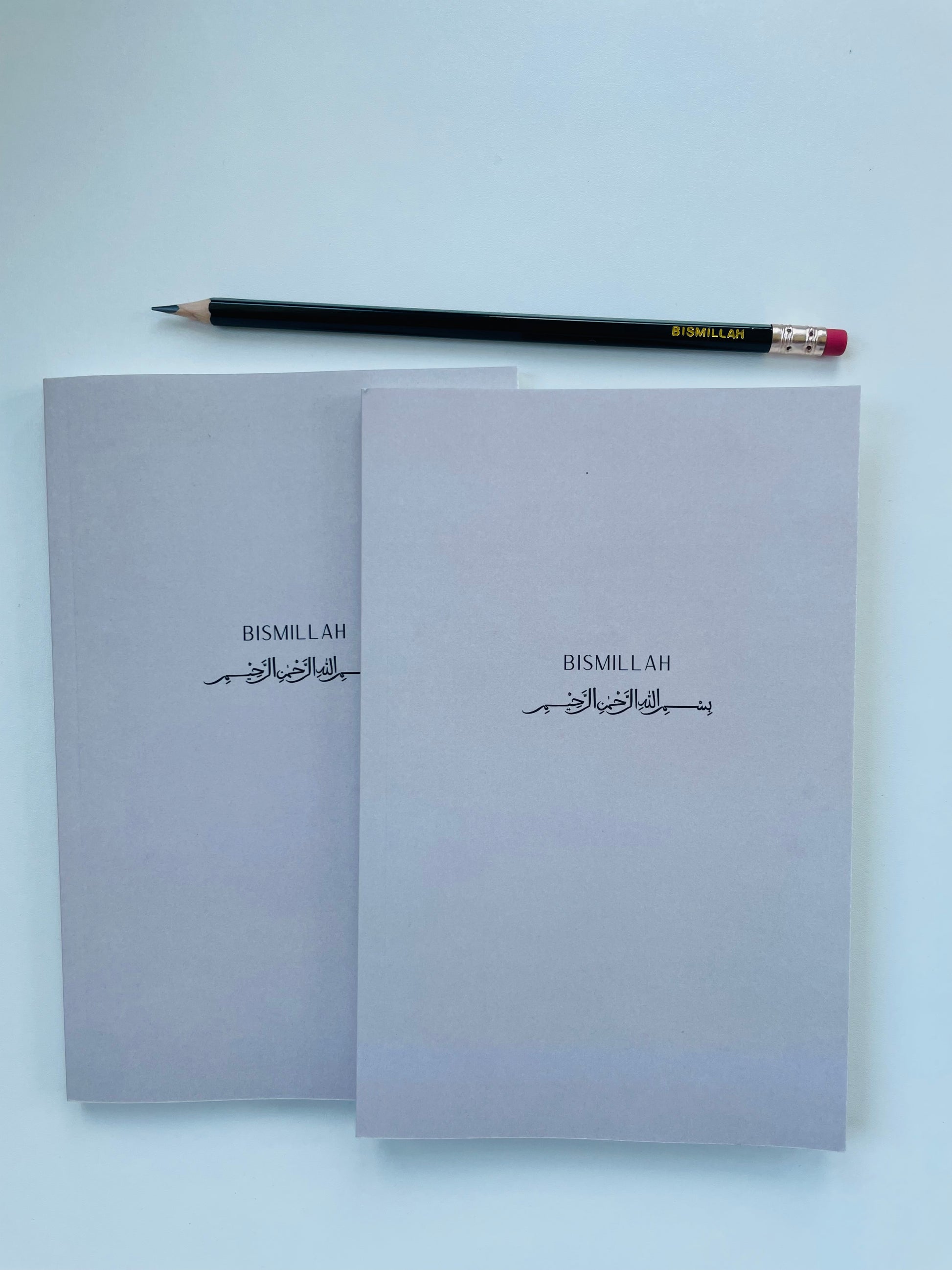 Bismillah Islamic lined notebook with aesthetic cover on desk
