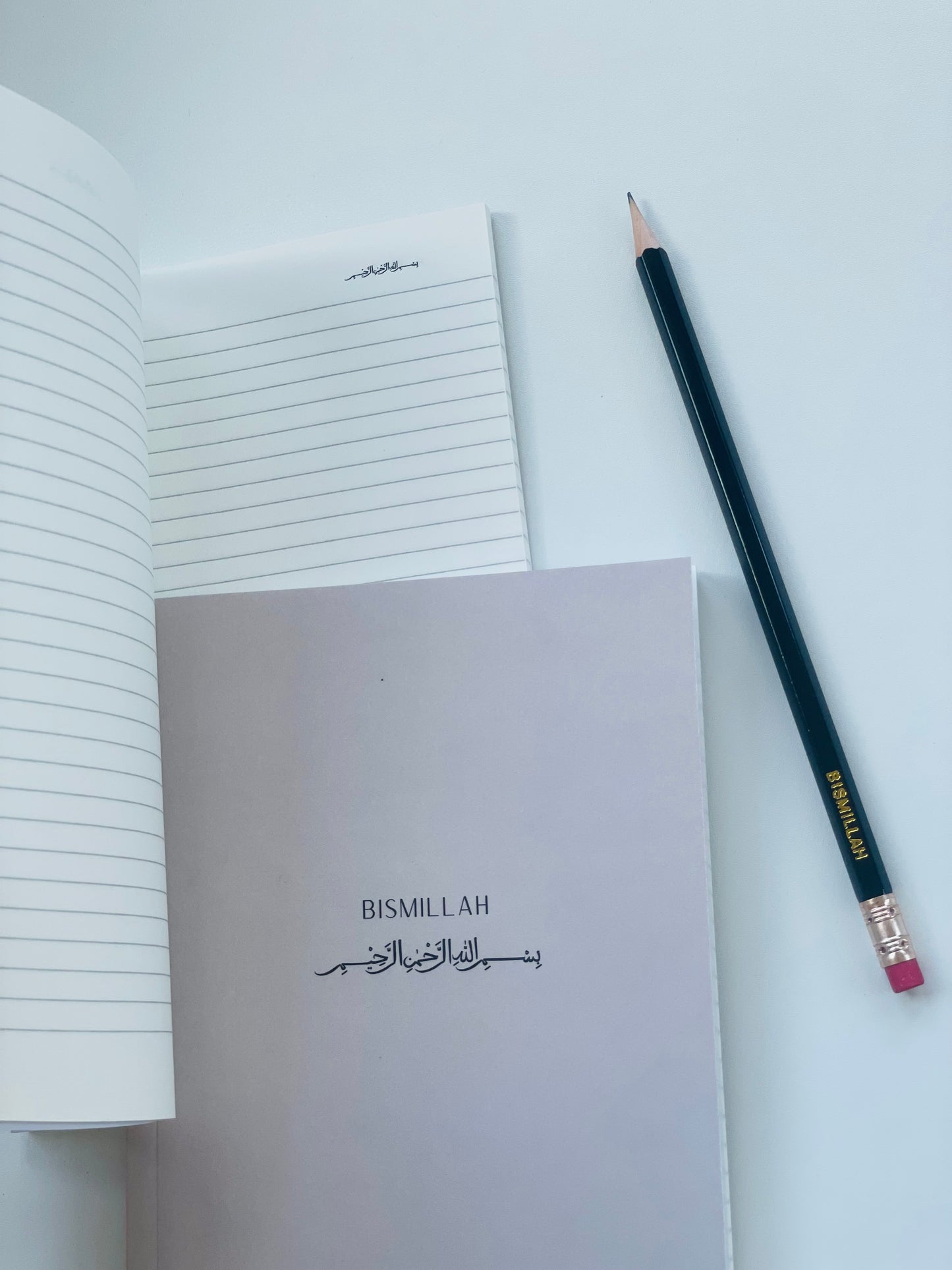 Bismillah Islamic lined notebook with aesthetic cover on desk