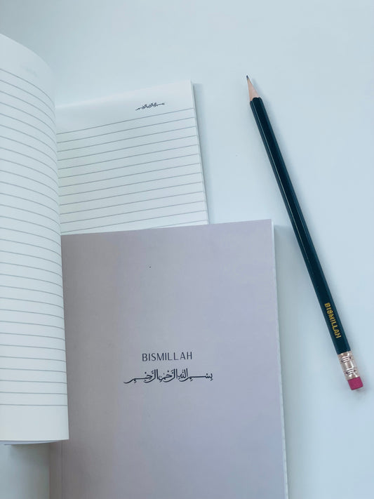 Bismillah Islamic lined notebook with aesthetic cover on desk