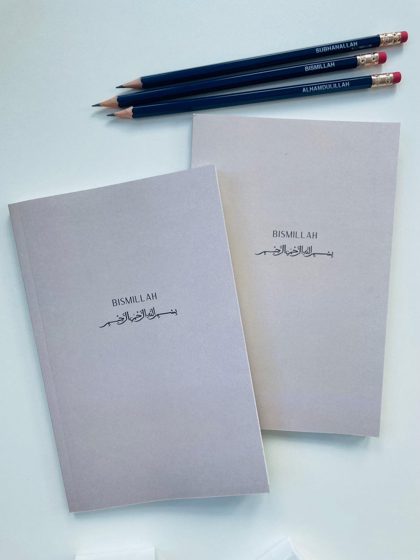 Bismillah Islamic lined notebook with aesthetic cover on desk